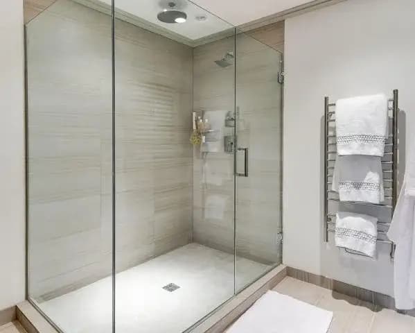 Glass shower enclosure
